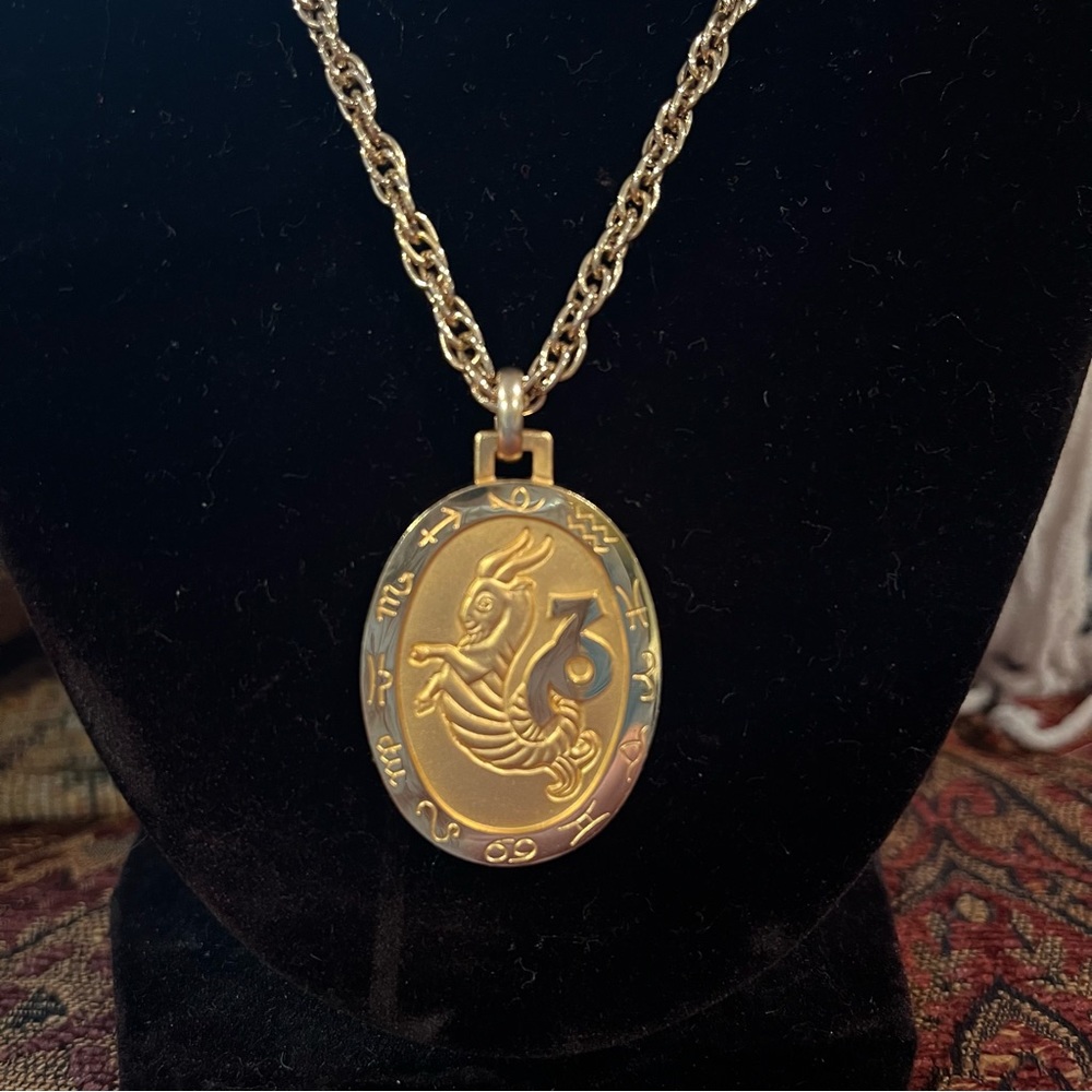 Vintage Swank Capricorn 10k GP necklace chain is 18” pendant is 1 1/2 “heavy